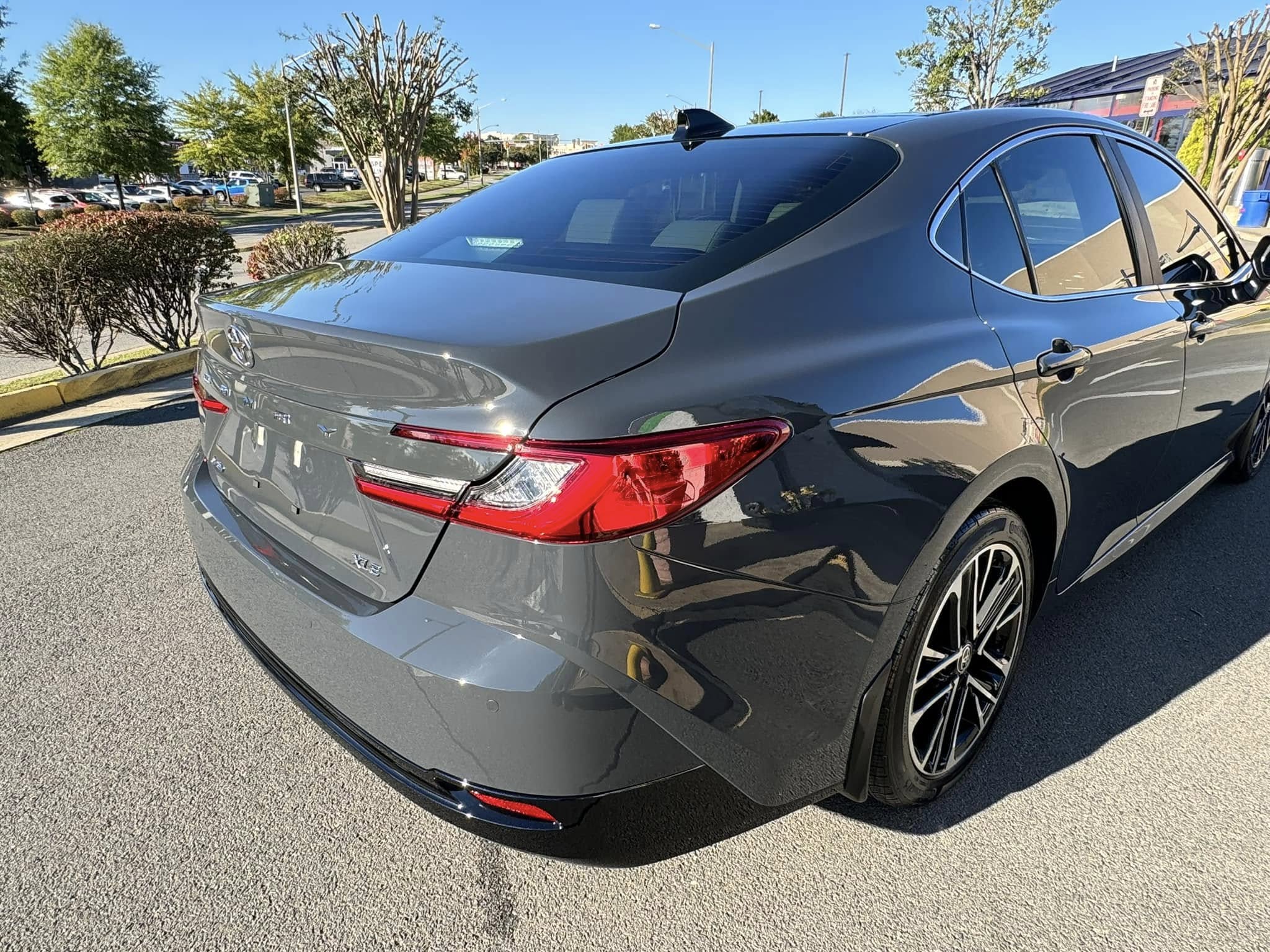 A grey sedan that just received car detailing services at Clean Car Wash and Detail in Fredericksburg, VA.