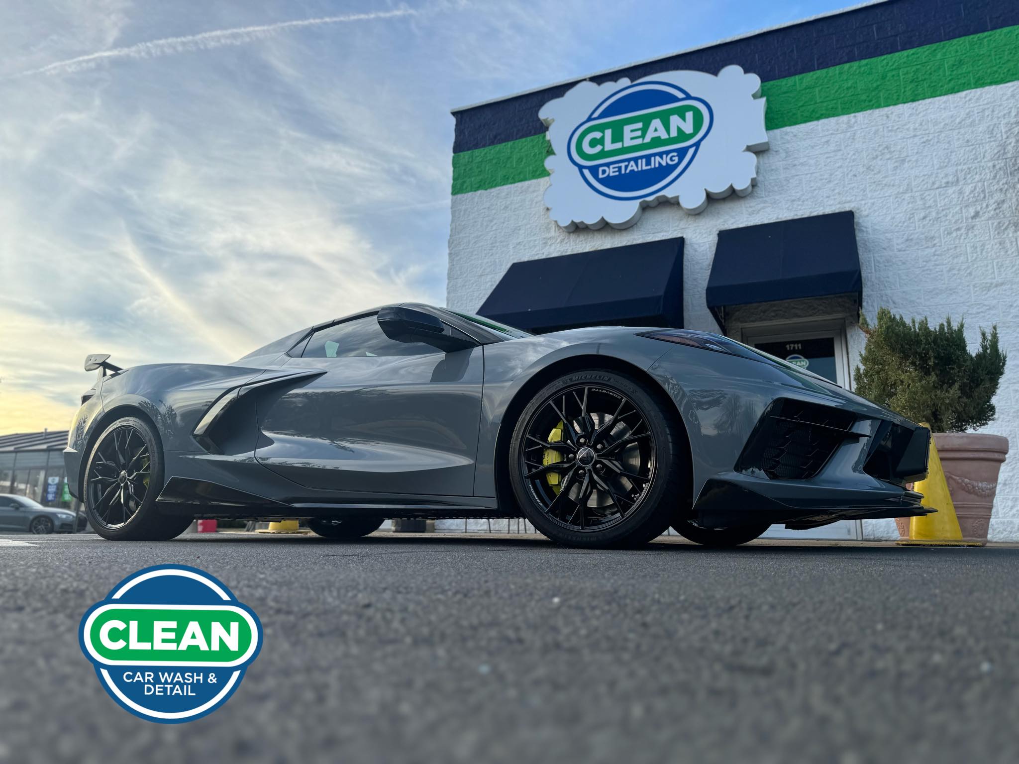 A photo of a silver sports car that received ceramic coating at Clean Car Wash and Detail in Fredericksburg, VA.