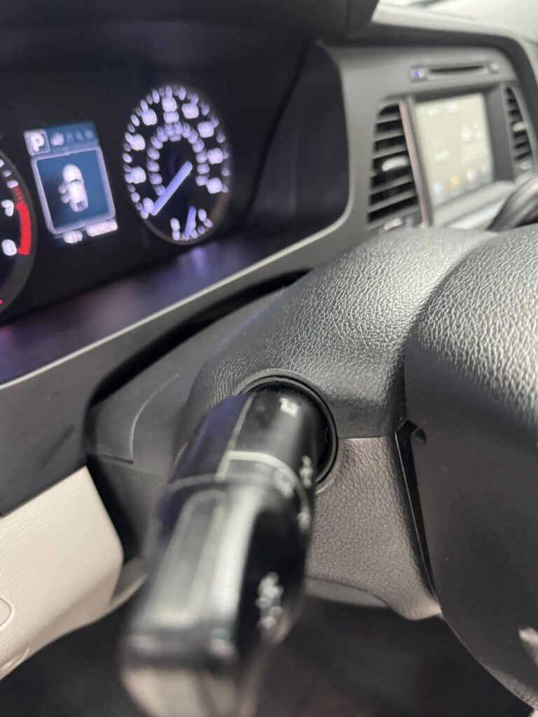 A photo of an immaculate car steering wheel after a car detailing appointment at Clean Car Wash and Detail in Fredericksburg, VA.