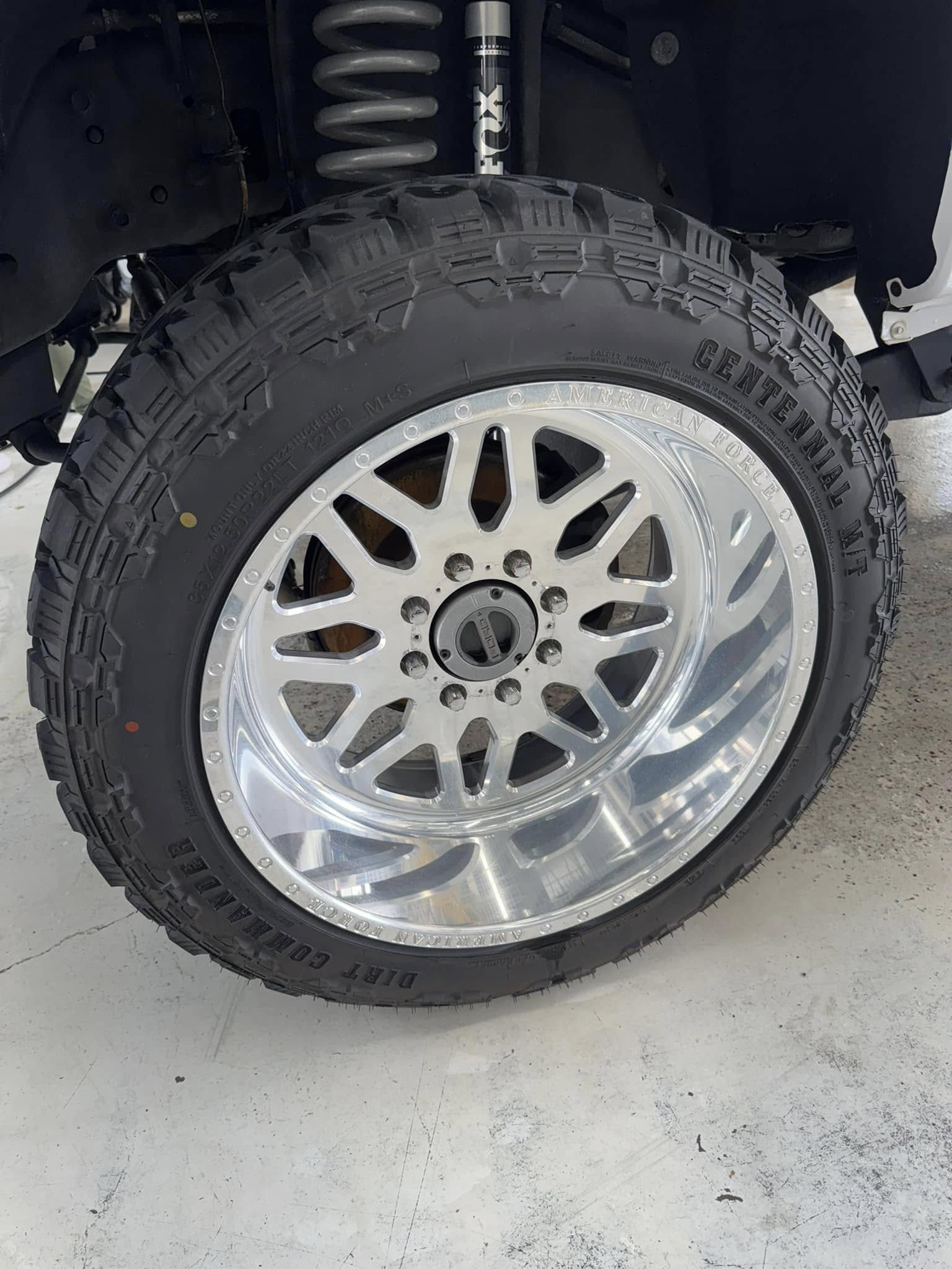 The after photo of the clean rim of a truck at Clean Car Wash and Detail in Fredericksburg, VA.